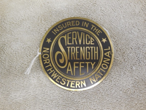 Northwestern National auto tag - BU#419 - brass