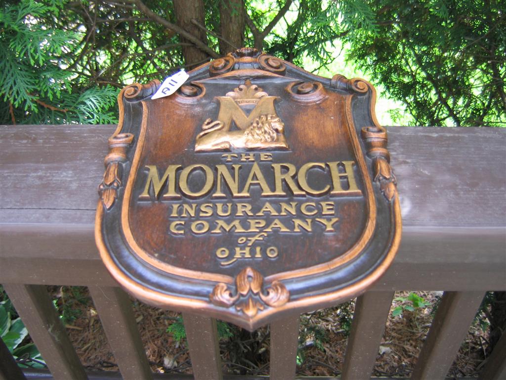 Sign. Heavy pressed board. The Monarch Insurance