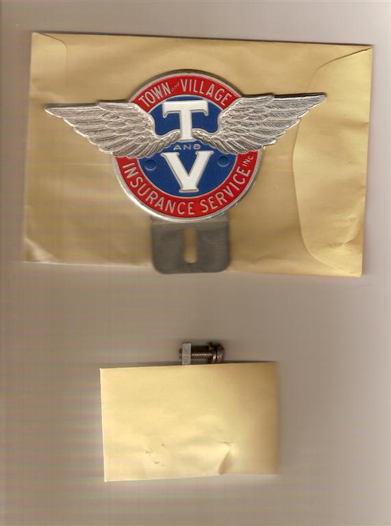 Town and Village Insurance Service tag in mint con