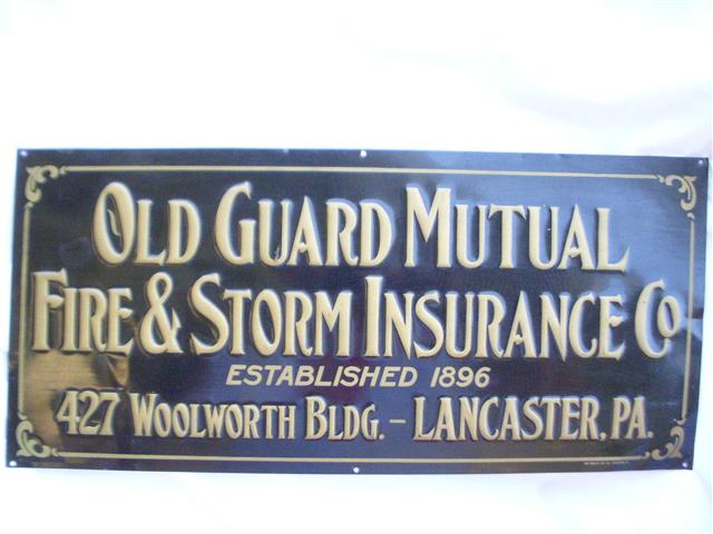 Old Guard Fire & Storm Insurance embossed tin sign