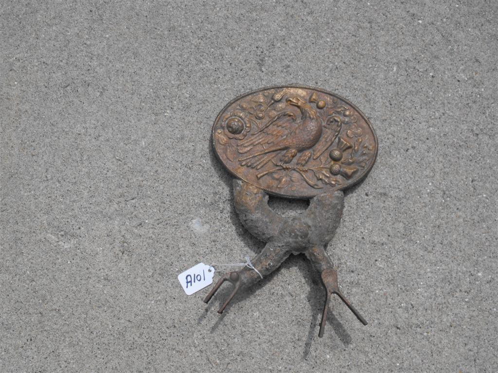 Grave Marker??? Very Heavy Metal. Eagle on top se