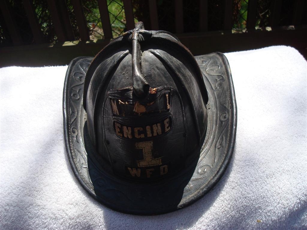 Fire Helmet. M. L. Engine 1 W.F.D. on front. Very
