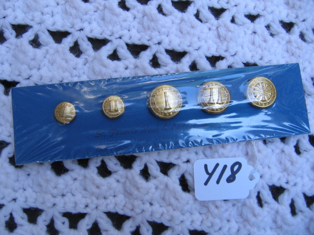 Buttons. Gold Color. Each Button has Raised Lett