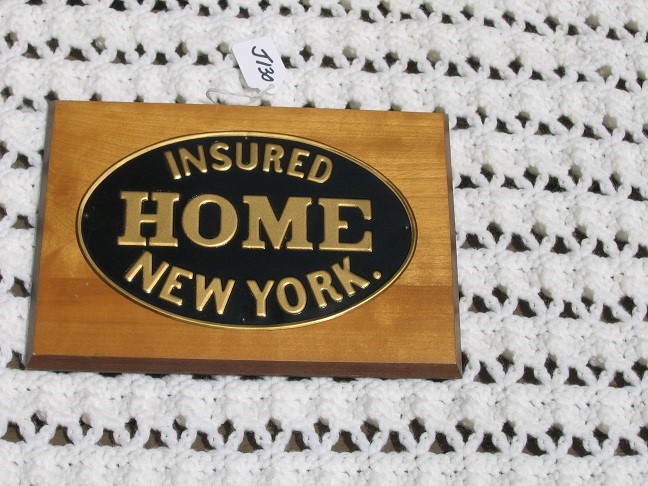 Insured Home New York. Reproduction Fire Mark on