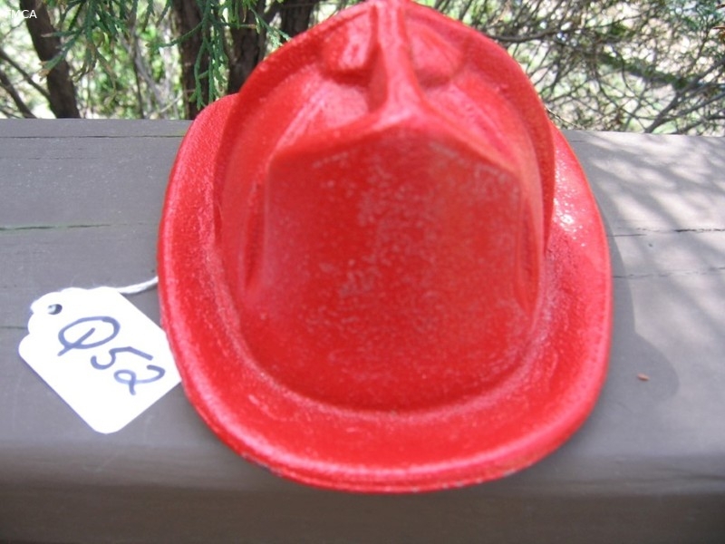 Red Fire Helmet - made out of cast iron(?). Heavy