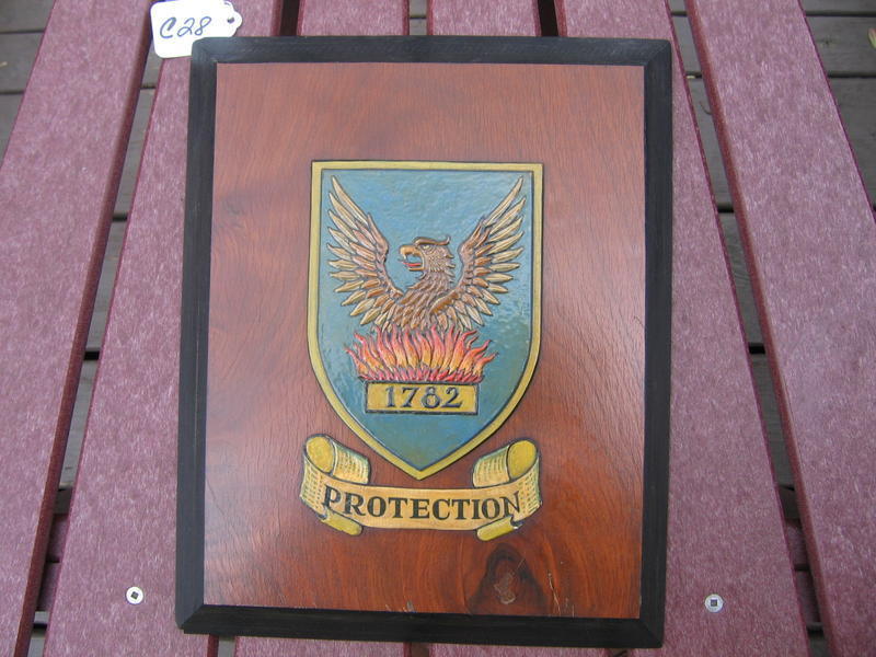 Phoenix Agency Plaque. Protection. Figure of the