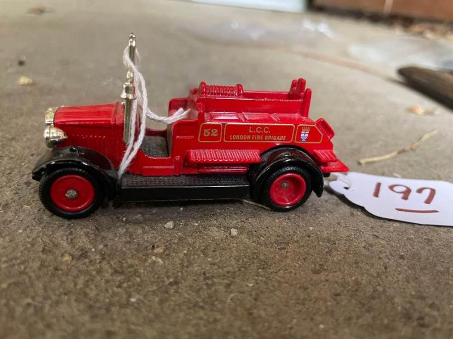 #051 Small red toy fire truck. For the London Fire Brigade