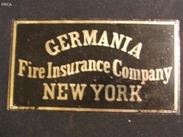 3.75" x 6.75" painted tin mark for the Germania Fi