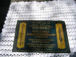 Underwriters Service Corp. Sign and Thermometer.