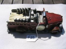 Toy Fire Engine. Door on one side says "Fire Depa