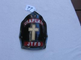 Fireman's Helmet Shield. "CHAPLAIN" and "JTFD" wi