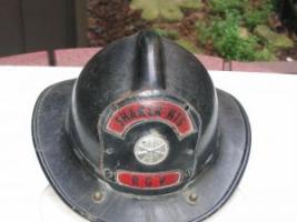 #209 Fireman’s Helmet from Shaker Heights with Helmet Shield on front.